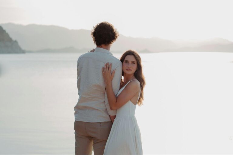 A woman hugging a man