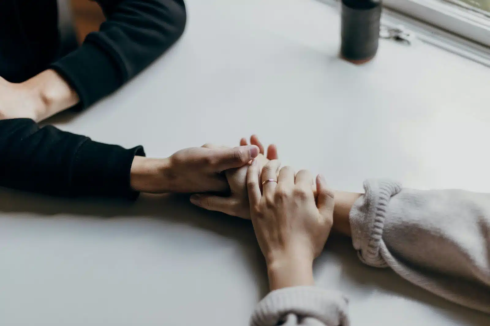 Couple holding hands