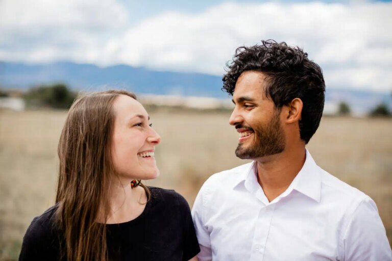 A man and woman looking at each other