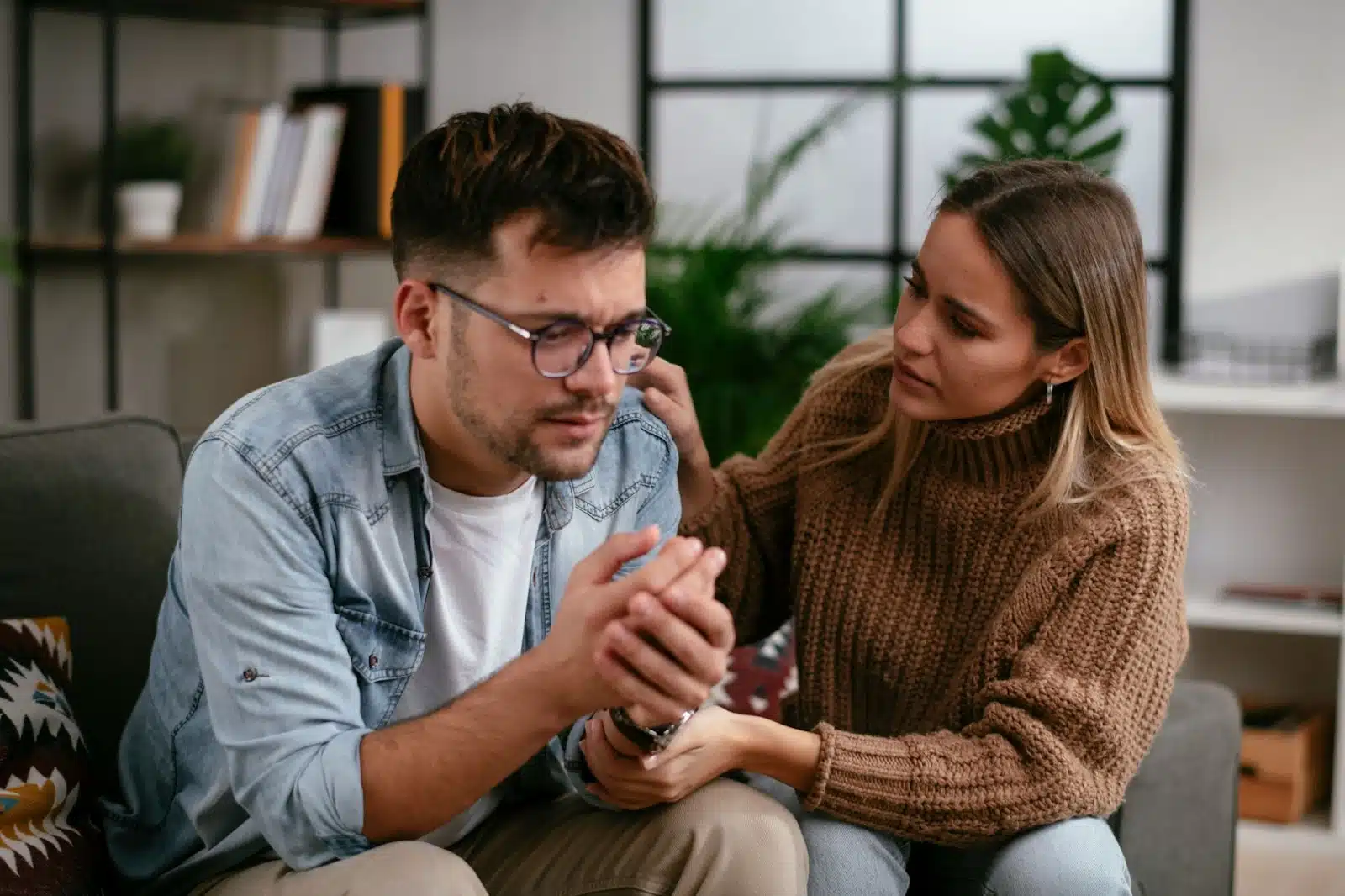 A woman talking to a man.